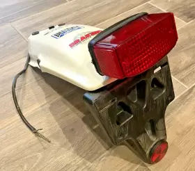 80100-KL4-670ZE HONDA Rear Fender Frame Taillight Plate Mount