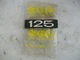 NOS! New! 1973 Suzuki TC125 TC 125 Side Cover Emblem 68141-28600 ahrma vintage