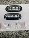 Yamaha  Tank Badges DS6 YR2 YR3 DT1  211-241-61   Nos Listing For a Pair Emblems