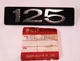 Suzuki 1973 TC125 Side cover Emblem 68141-28600 NOS