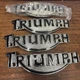 Triumph OEM T3900086 L/H Fuel Tank Badge Emblem New America Bonneville Legend